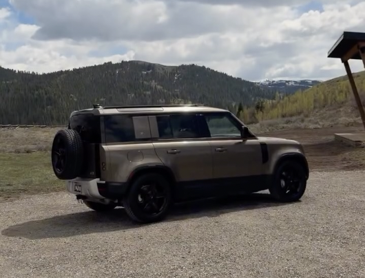 Land Rover Defender in Jackson Hole mountain scenery